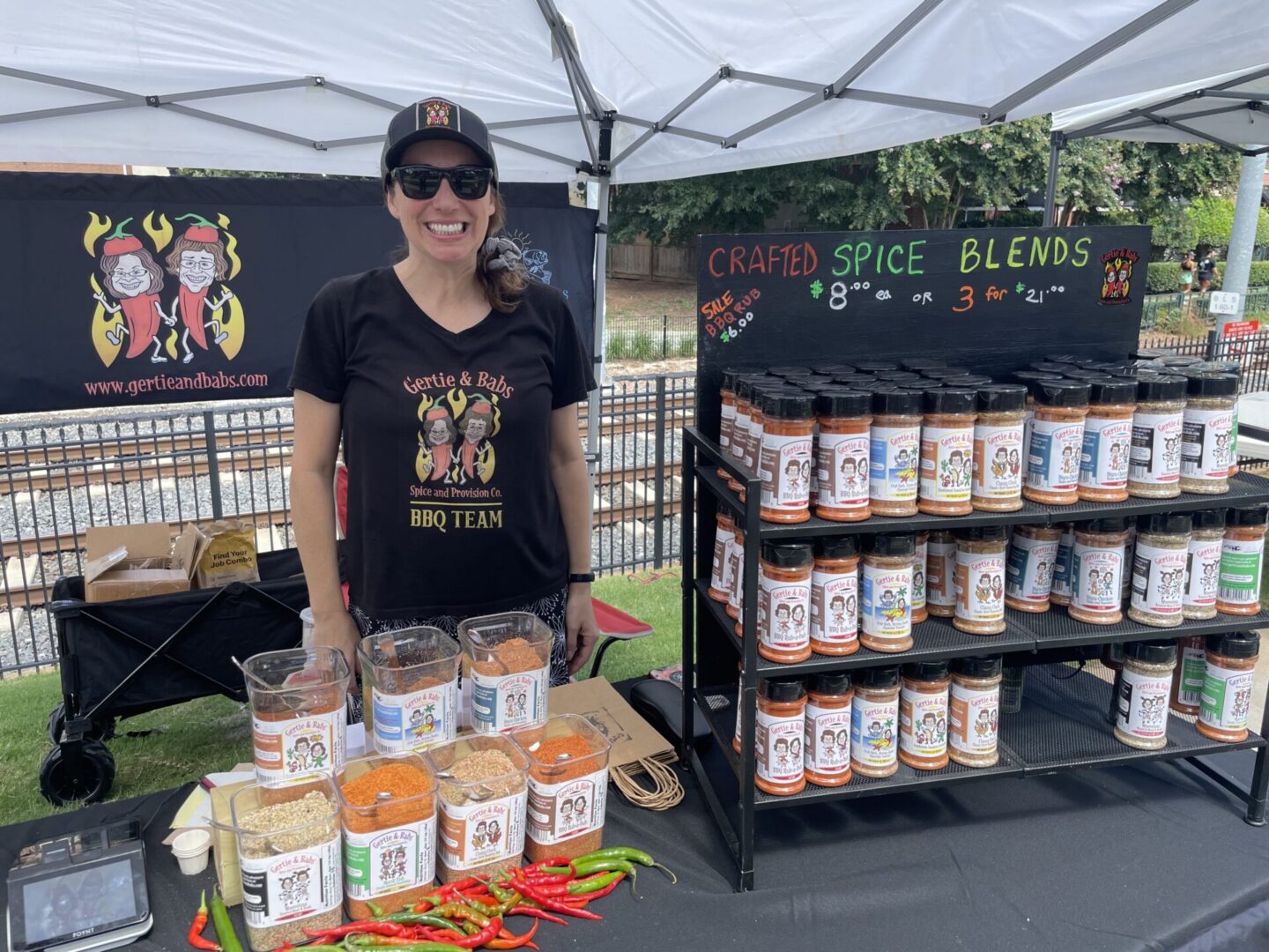 A woman selling crafted spice blends