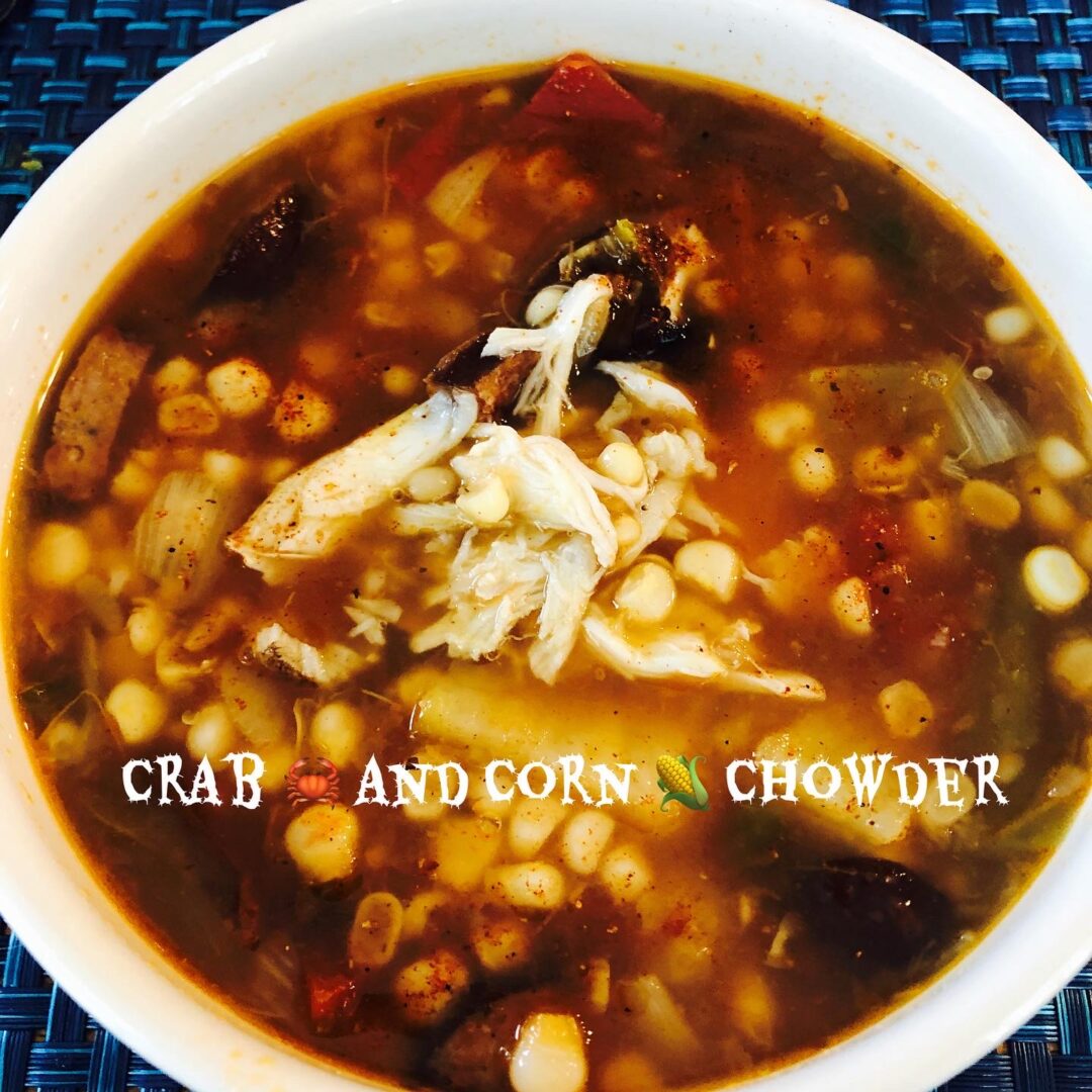 A bowl of crab and corn chowder.